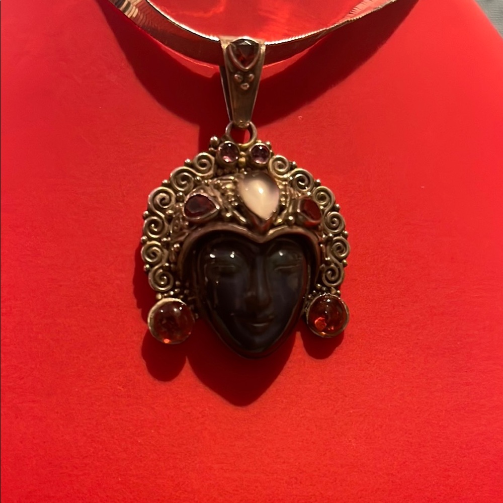 Elegant Gold and Black Pendant